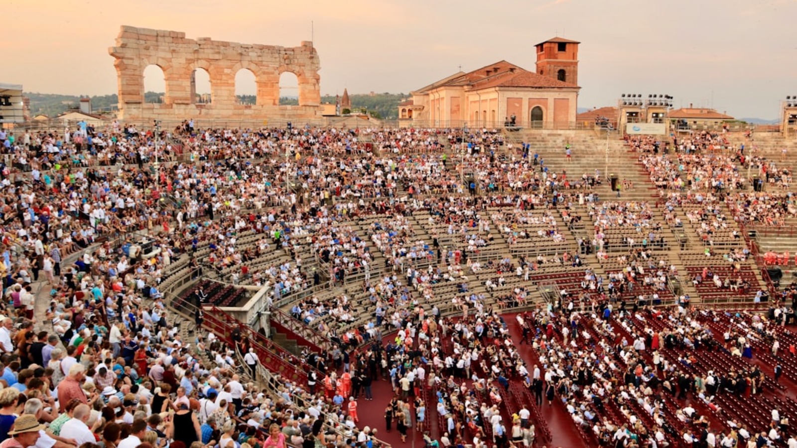Audience sitting at the galleries of Arena di Verona
